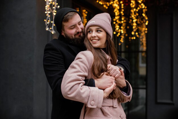 young couple outdoor hugging