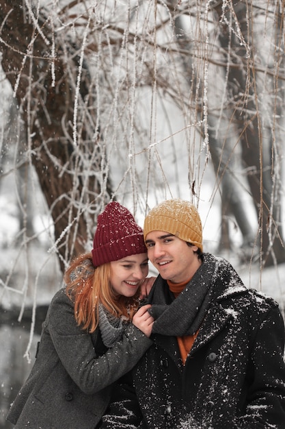 Young couple portrait in the winter