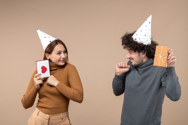 A young couple posing in the studio