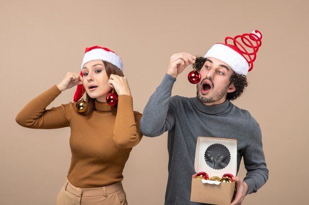 A young couple posing in the studio