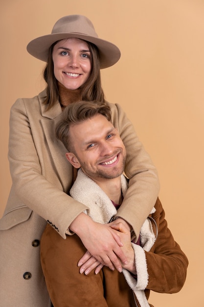 Young couple posing together before traveling