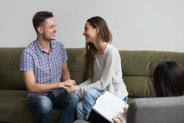 Free photo young couple reconciled after quarrel