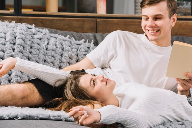 Young couple relaxing on couch