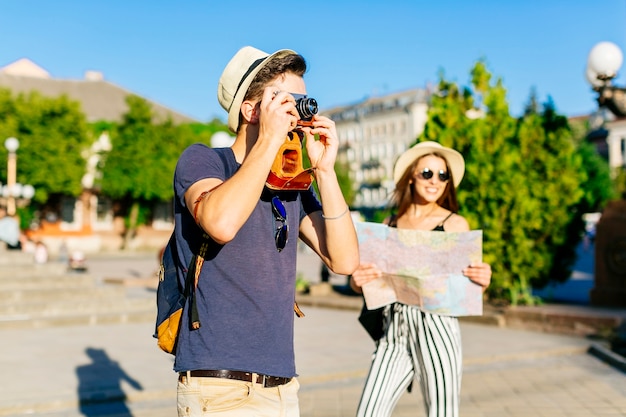 Free photo young couple sightseeing