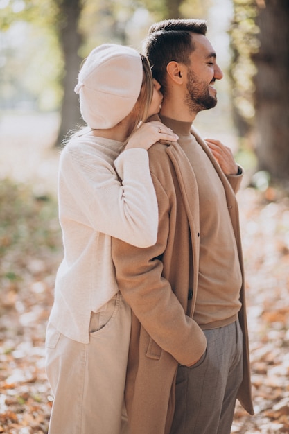 Free photo young couple together in an autumn park