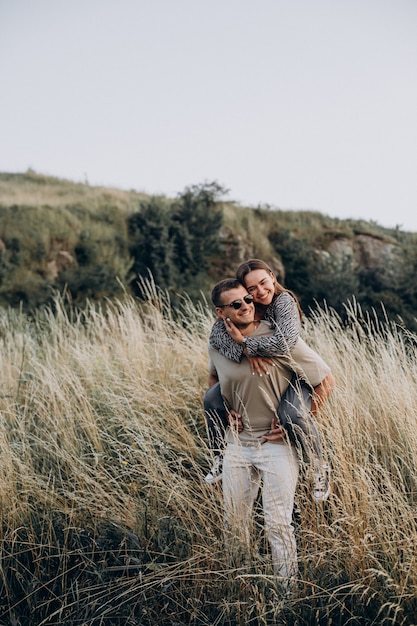 Young couple together in meadow