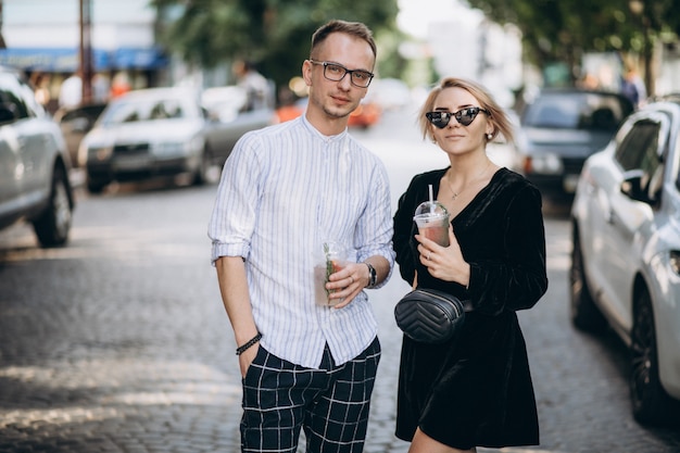 Free photo young couple together in town