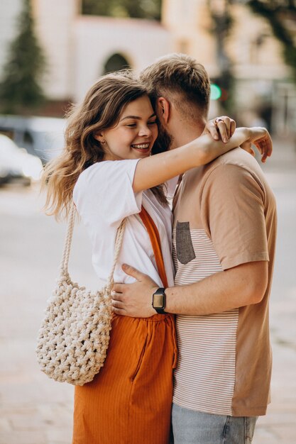 Young couple together in town