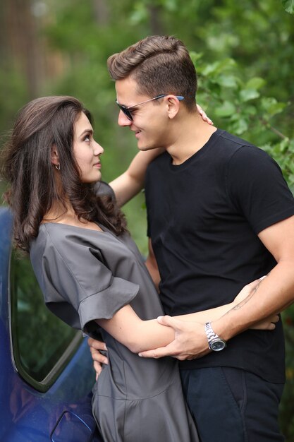 Young couple traveling by car