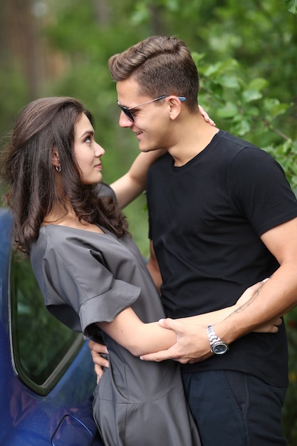 Young couple traveling by car