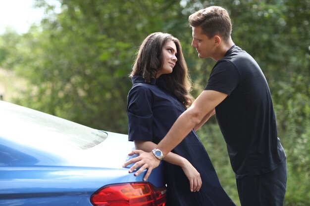 Young couple traveling by car