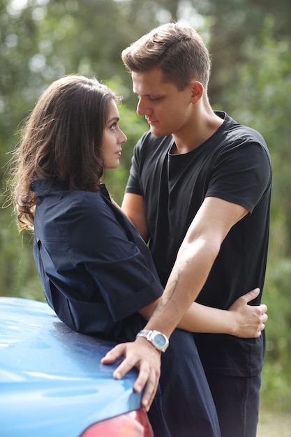 Young couple traveling by car