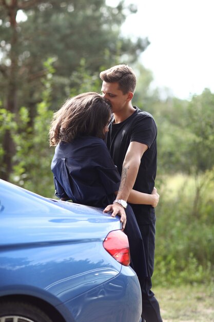 Young couple traveling by car