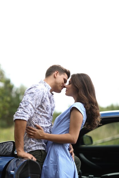 Young couple traveling by car