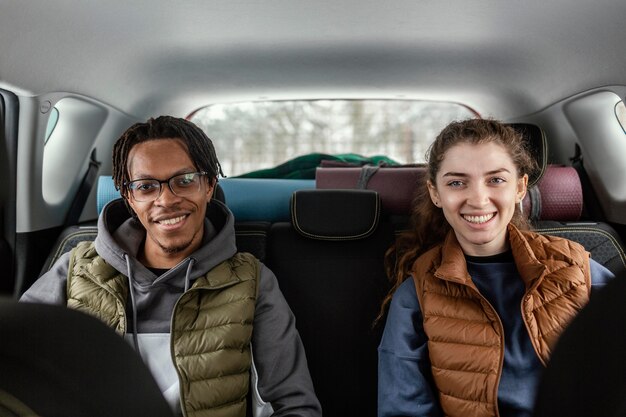 Young couple traveling by car