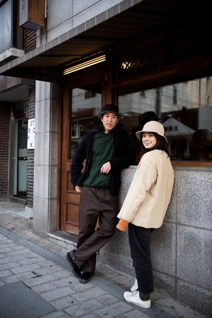 Young couple wearing bucket hats