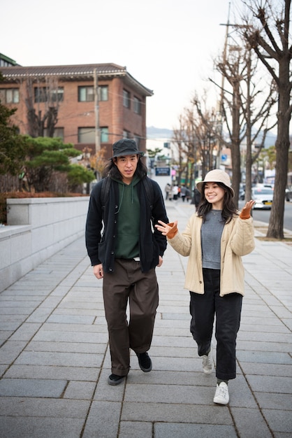 Young couple wearing bucket hats