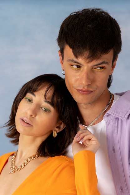 Young couple wearing chain necklace