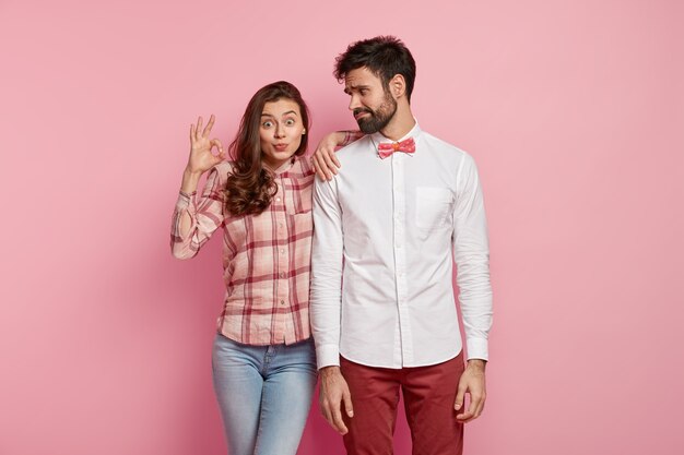 Young couple wearing colorful clothes