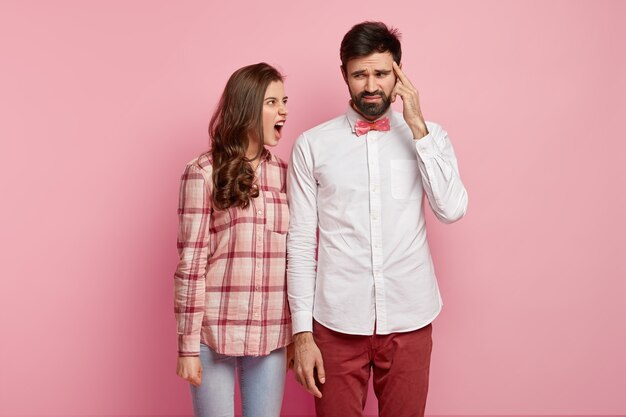 Young couple wearing colorful clothes