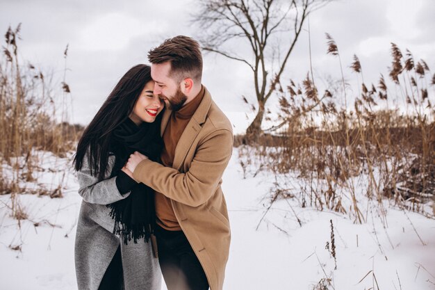 Young couple in winter park