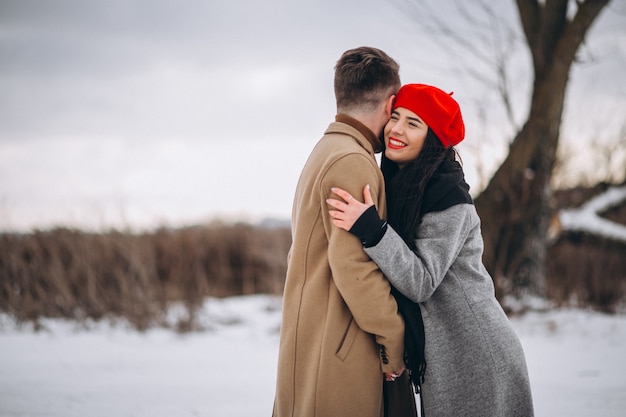 Young couple in a winter park