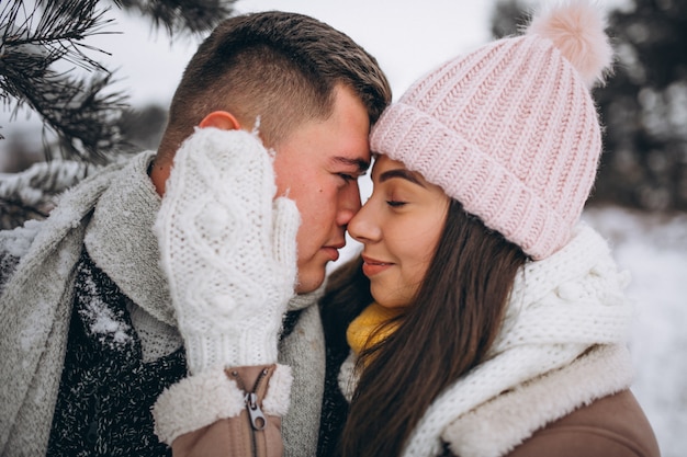 Young couple in winter park