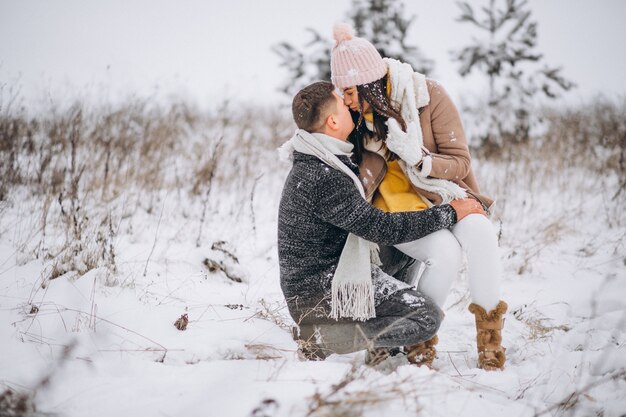 Young couple in winter park