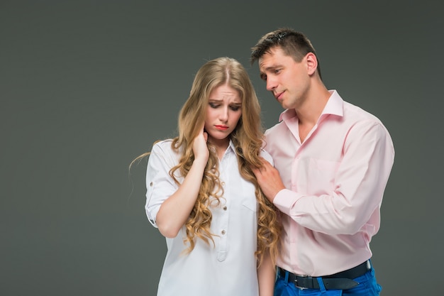 young couple with different emotions during conflict