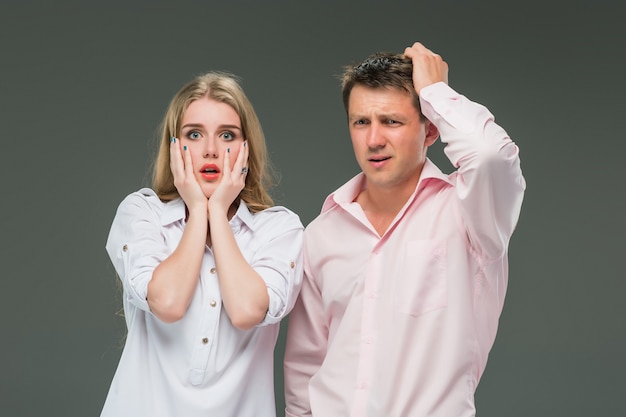 The young couple with different emotions during conflict