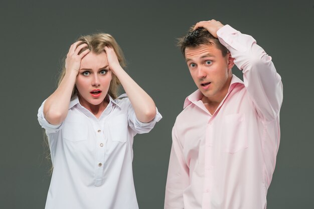 The young couple with different emotions during conflict