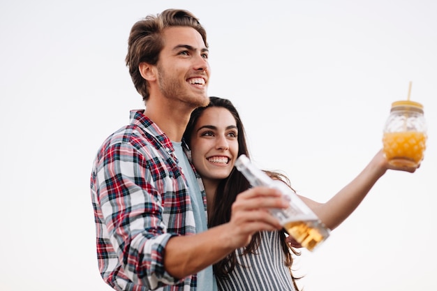 Young couple with drinks