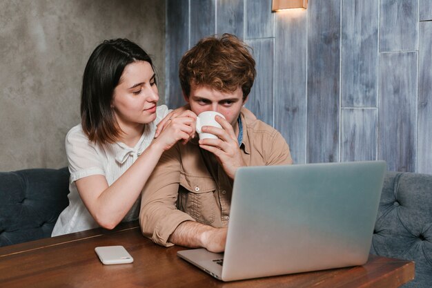 Young couple working on the laptop