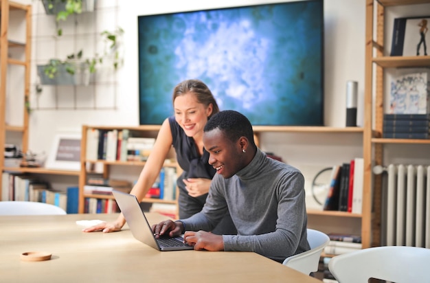 young couple works in a modern office