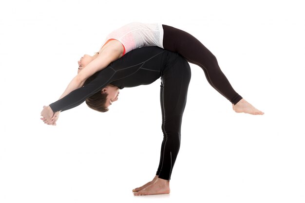 Young couple in yoga posture