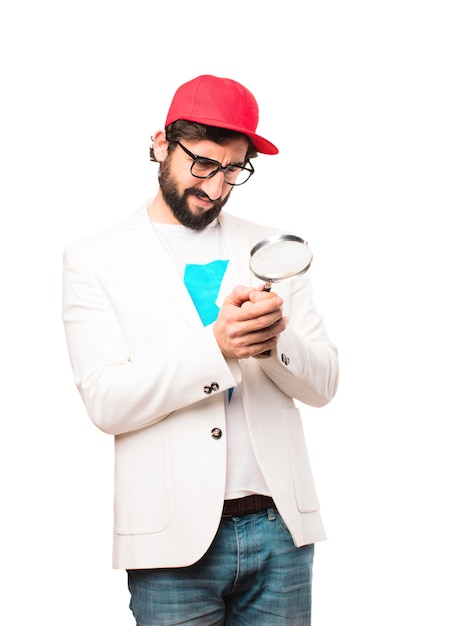 young crazy businessman with magnifyng glass