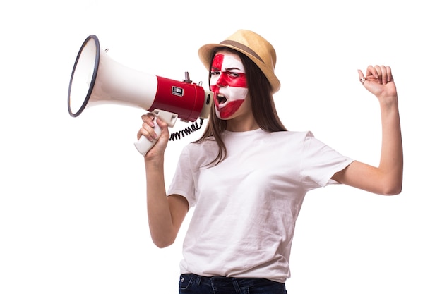 Free photo young croatian football fan with megaphone solated on white wall