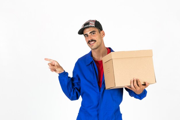 Young deliveryman with box