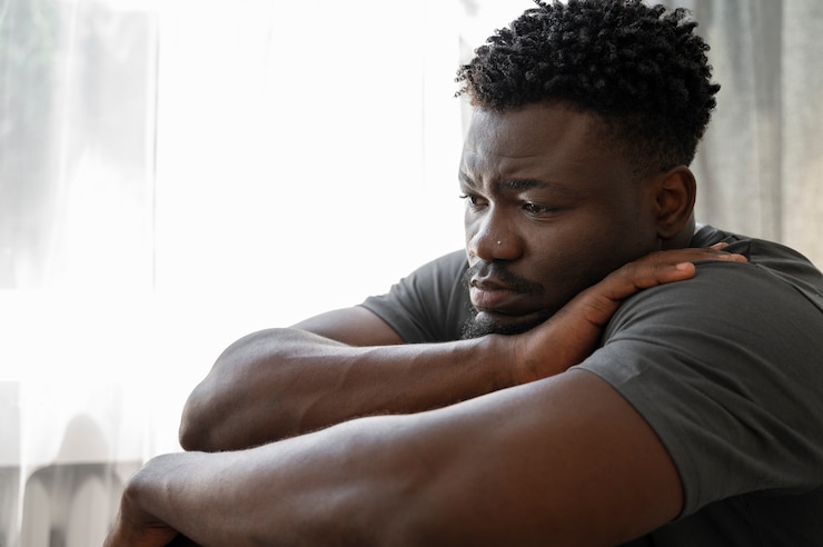 Free Photo young and depressed adult at home