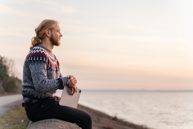 Young digital nomad traveling in  winter time