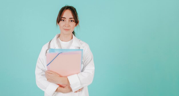 Young doctor with papers