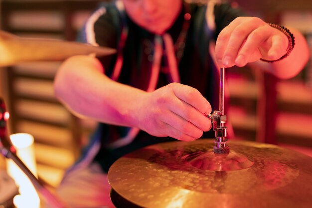 Young drum player during a live concert