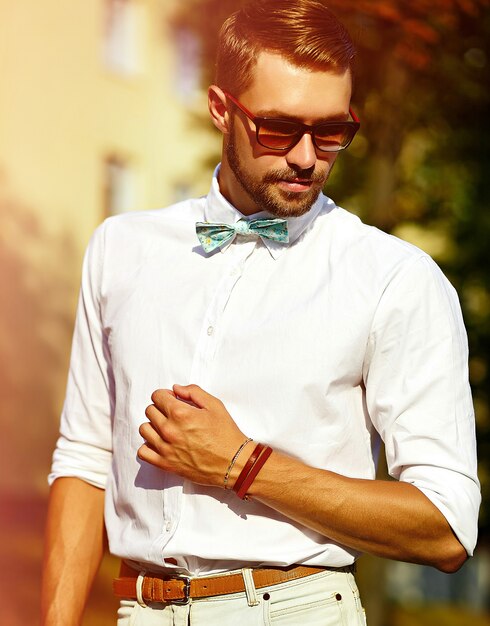 Young elegant man on street