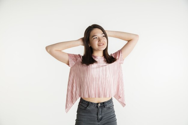 Young emotional woman in casual clothes