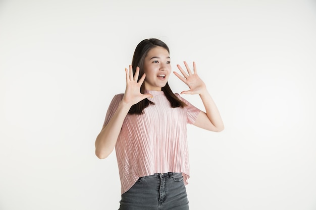 Young emotional woman in casual clothes