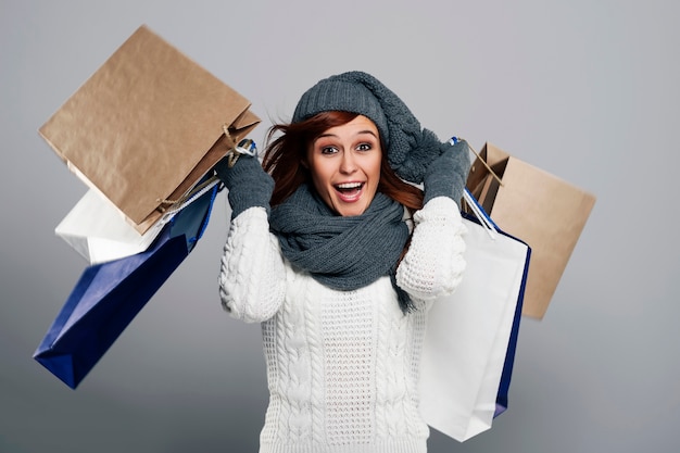 Young excited woman during the winter sale