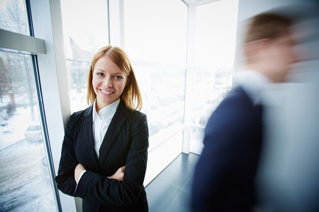 Young executive woman with crossed arms