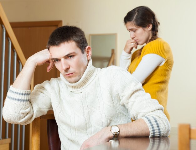 Young family conflict. Young wife having conflict with husband