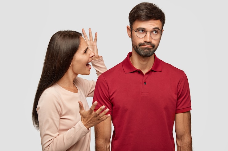 Free Photo young family couple have conflict. angry brunette young european woman gestures with hands