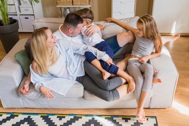 Young family looking at each other